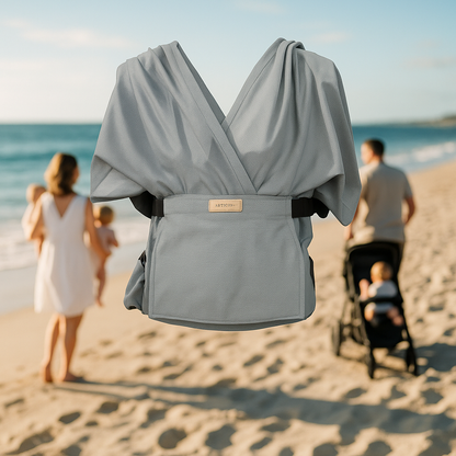 Escharpe de portage grise avec parents sur la plage 