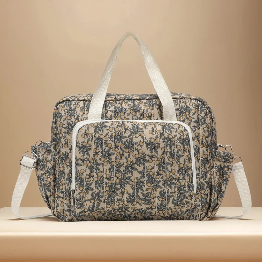 sac a langer brun avec design orange 