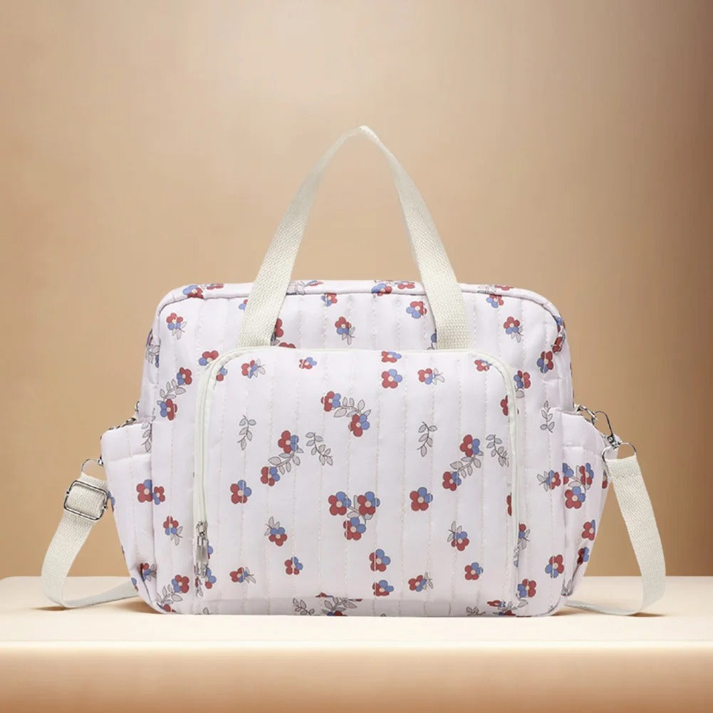 sac a langer blanc floral rouge et bleu 